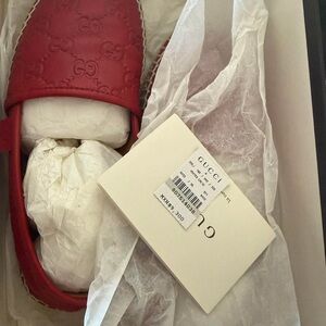 Gucci Crimson Embossed Slip-Ons